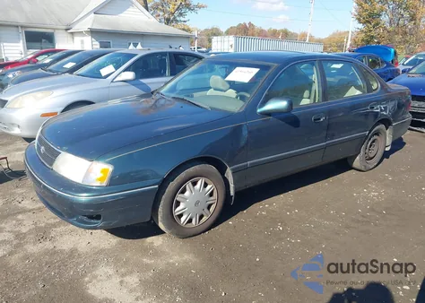 1999 Toyota Avalon Xl z USA, uszkodzony, nr VIN 4T1BF18B6XU343123